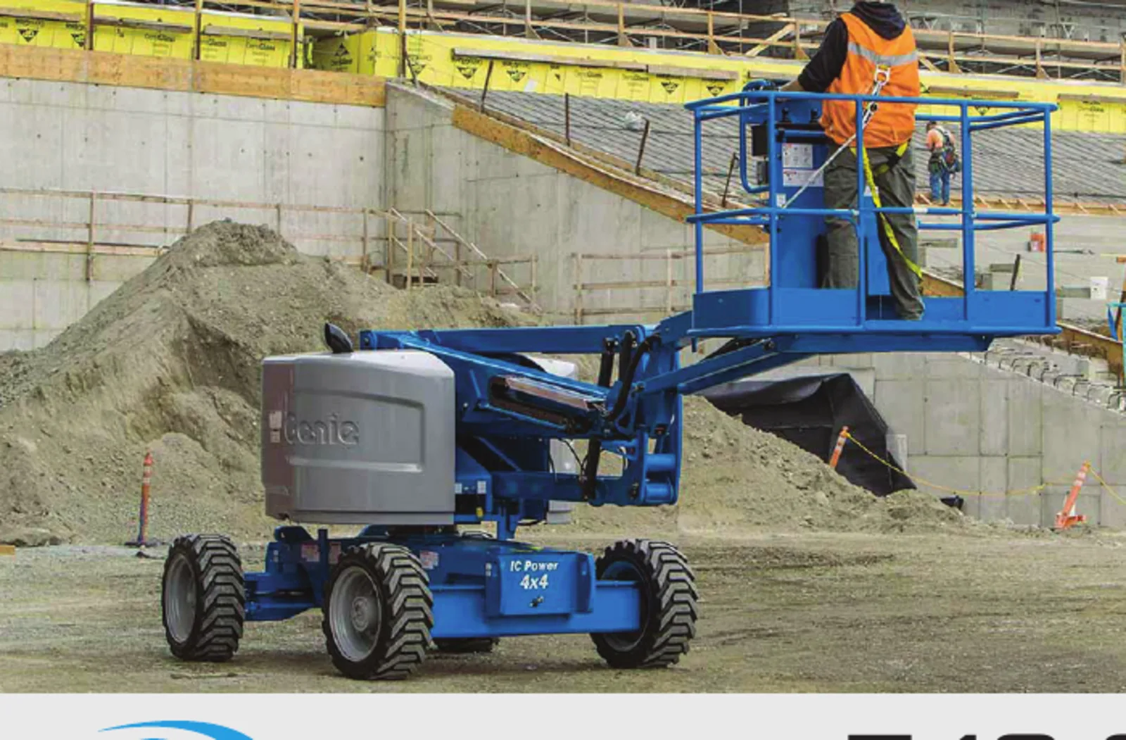 Worker on a Genie 4x4 IC Power articulating boom lift at an active Ohio Valley construction site