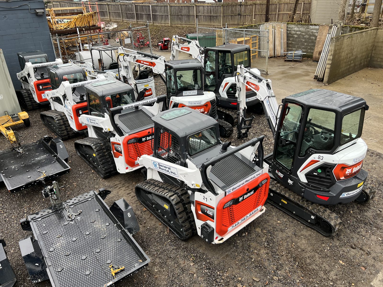 Overhead view of General Rental's Bobcat compact track loaders and mini excavators lined up in the Steubenville yard