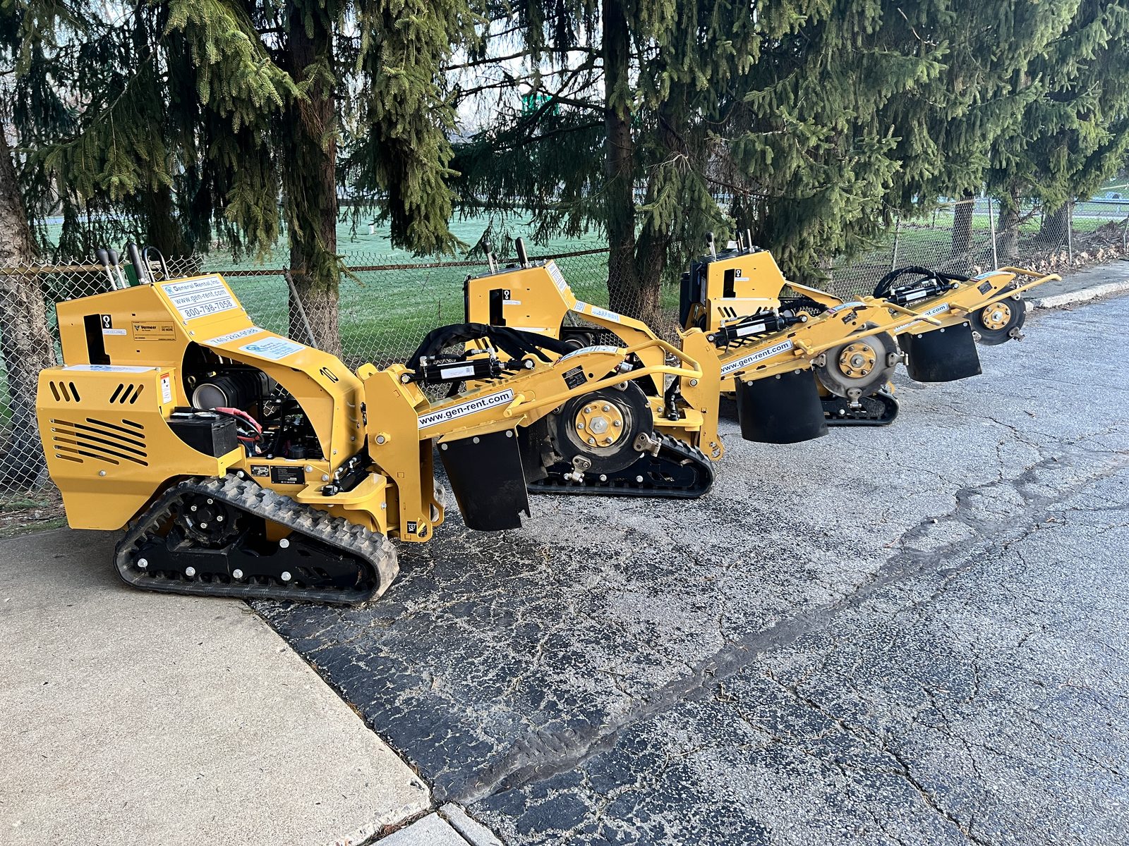 Four Vermeer stump grinders on tracks lined up at the General Rental Steubenville equipment yard