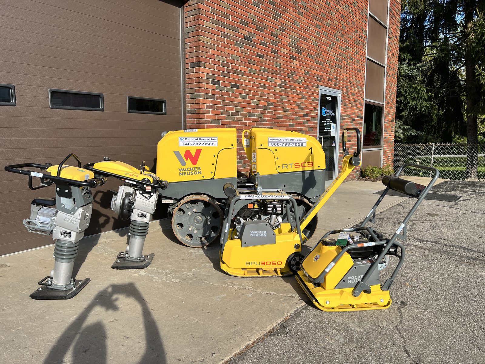Wacker Neuson compaction equipment staged outside General Rental's Steubenville headquarters building at 1606 Sunset Blvd